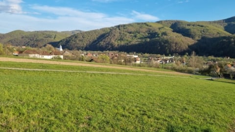 teren de vanzare Negreni Cluj panorama larga spre sat si dealuri